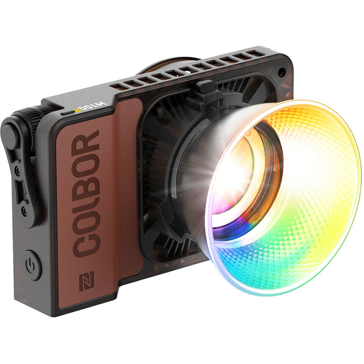 Projecteur LED COLBOR Wonder Series RGB 100W avec lentille colorée et design compact, adapté pour la photographie et la vidéographie.