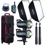 Kit d'éclairage Godox SK400 II comprenant deux lampes, des diffuseurs, un émetteur sans fil et un sac de transport.